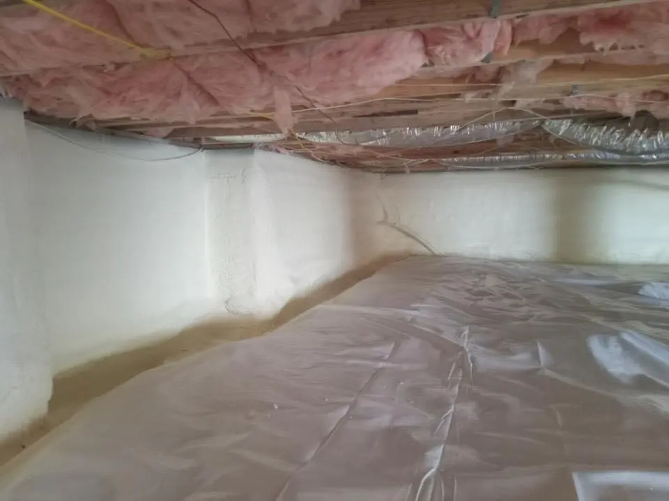 Crawl space encapsulation with closed-cell spray foam for Commercial Roof Restoration in Winnetka
